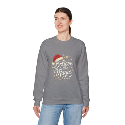 Believe in the Magic Women's Christmas Shirt, Santa Hat Holiday Cozy Sweatshirt, Women's Heavy Blend™ Crewneck Sweatshirt